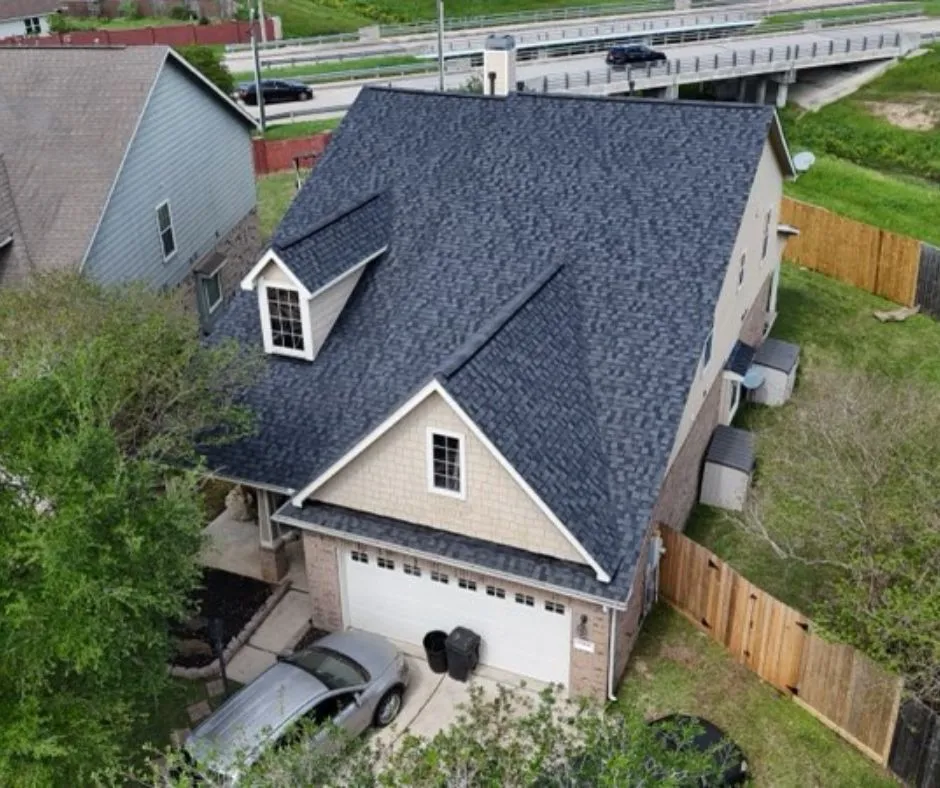 Finished asphalt shingle roof on a Conroe, TX home installed by North American Roofing Company