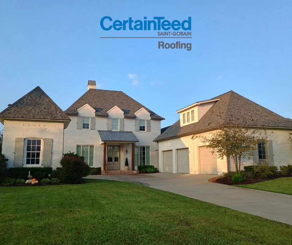 alt="certainteed select shingle master home in spring, asphalt shingle roof on a white house with a blue sky"